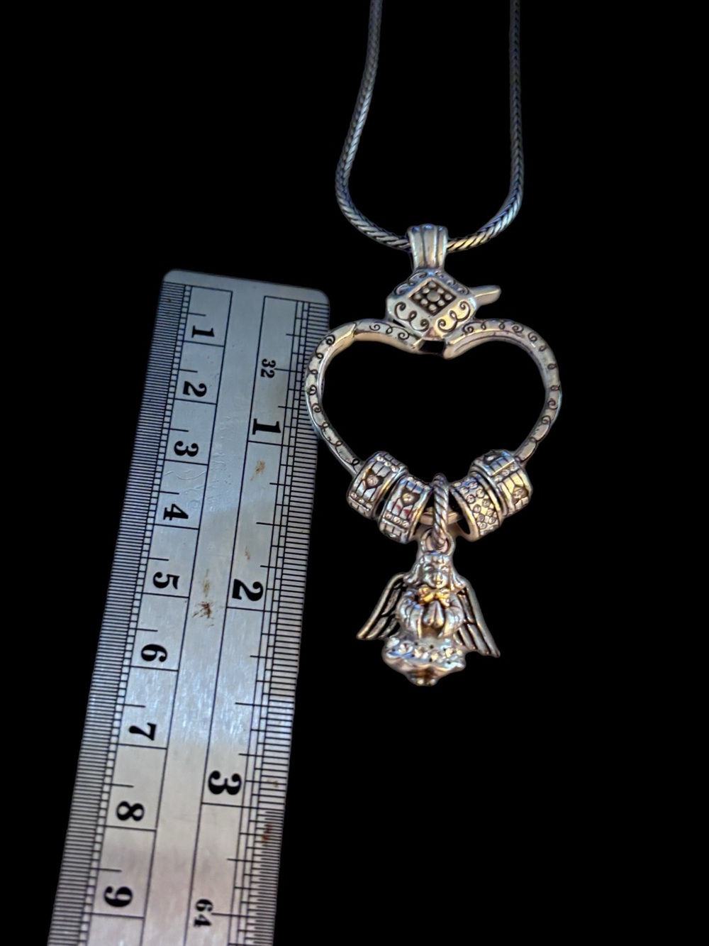 Brighton "Squeeze My Heart" charm holder necklace featuring an angel charm.